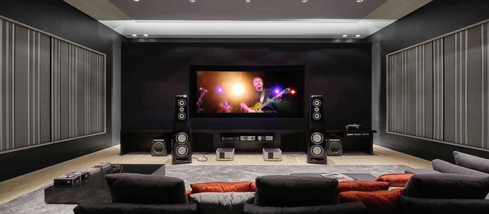 Dedicated home cinema with projector screen and seating