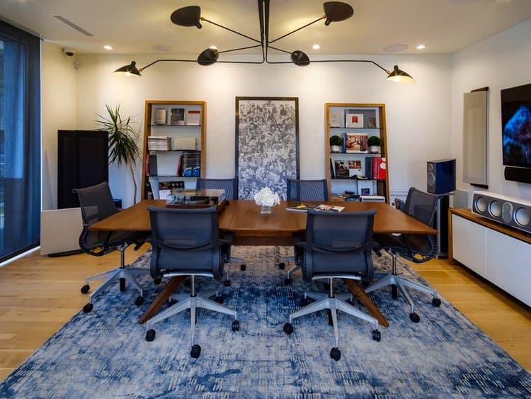 Sound Insight installer working on an equipment rack